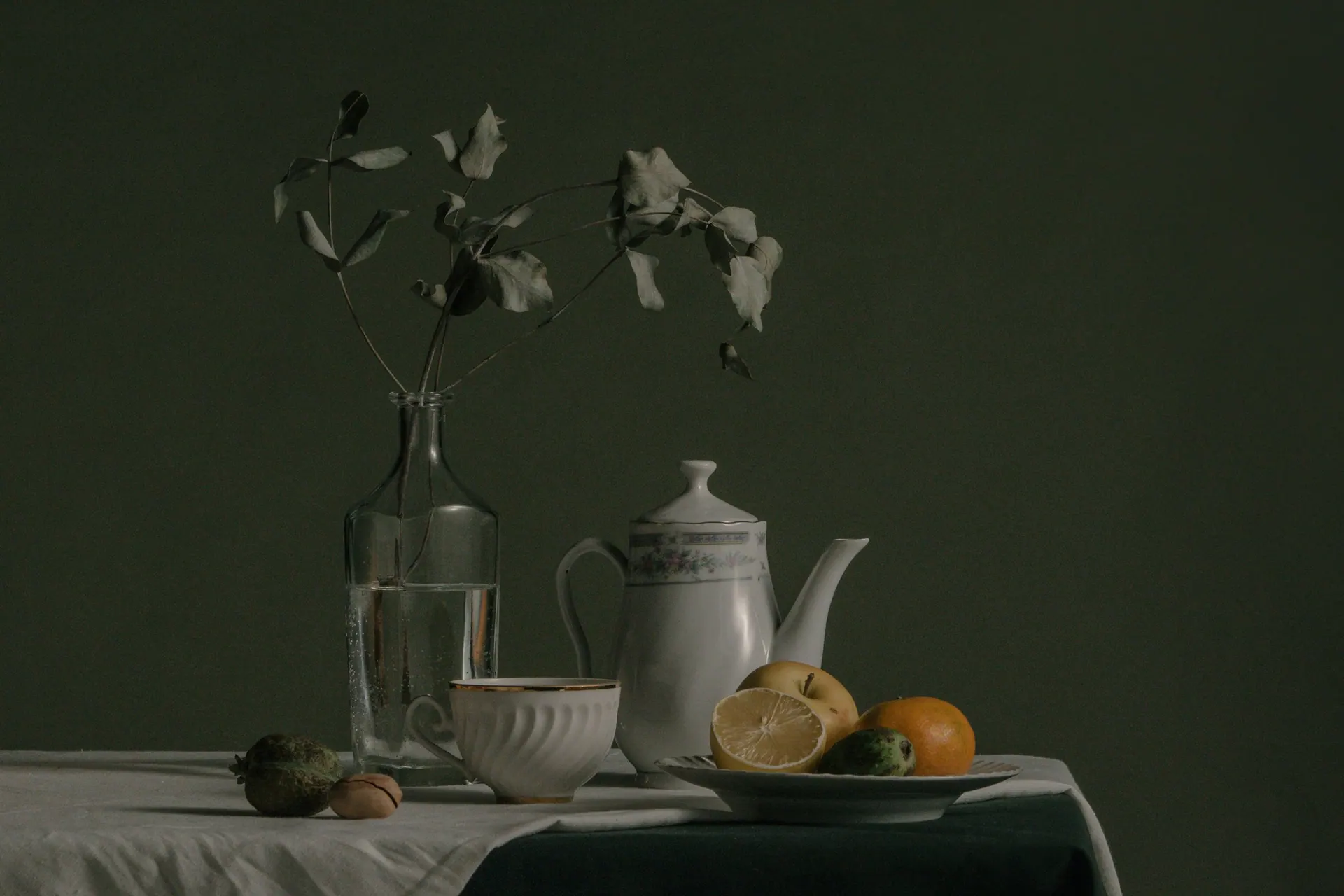 A still-life commercial photography arrangement lit with controlled directional light.