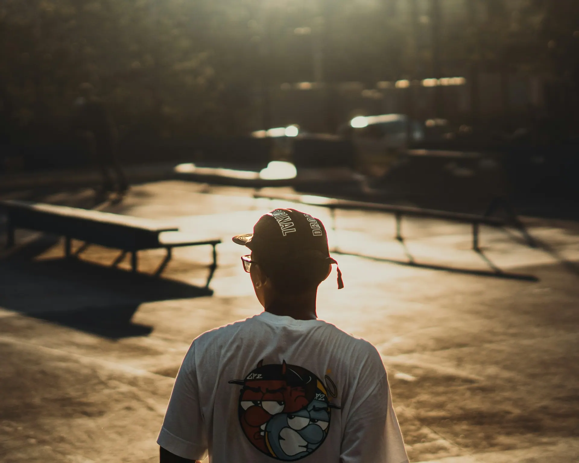 An outdoor lifestyle photography scene lit by low golden-hour sunlight.